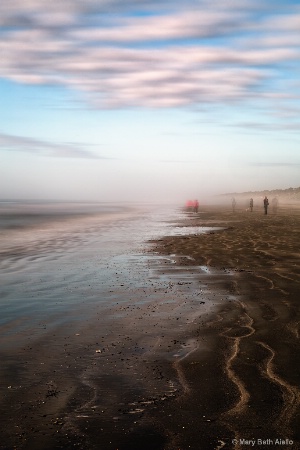 Beach Walkers in the Fog