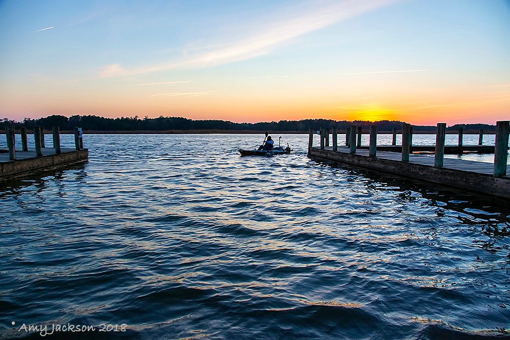 Man on Kayak at Sunset