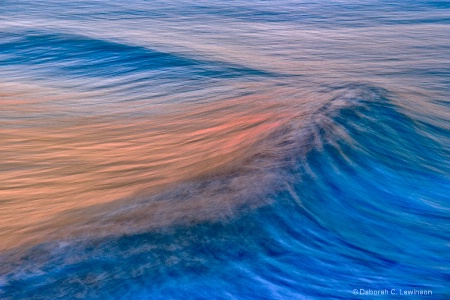 Panning waves at sunset