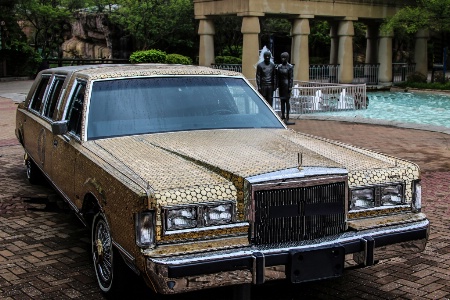 Lincoln stretch limo covered in coins