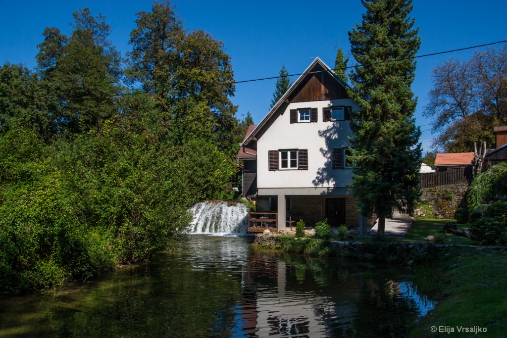 A house on a waterfall