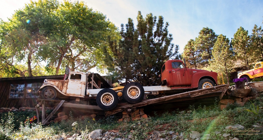 2 old trucks at the gold mime in Jerome