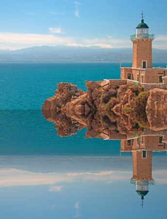 Lighthouse and its symmetrical image.