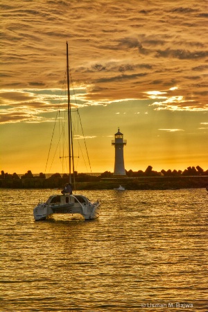 A Lighthouse and a Catamaran