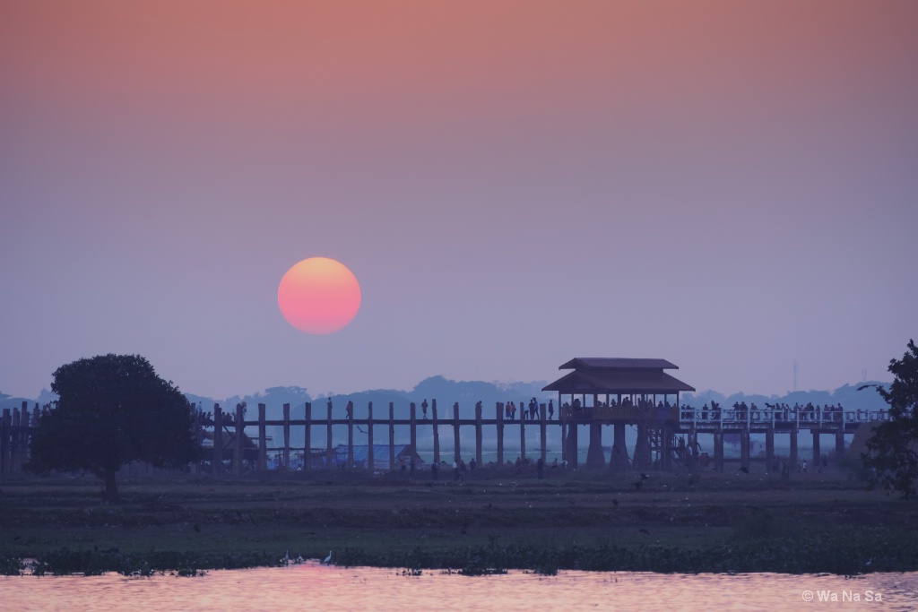 Sunset over U Bein bridge.