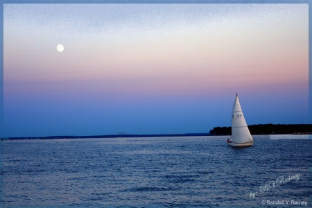 Tranquil Sail under the moon at sunset . . .