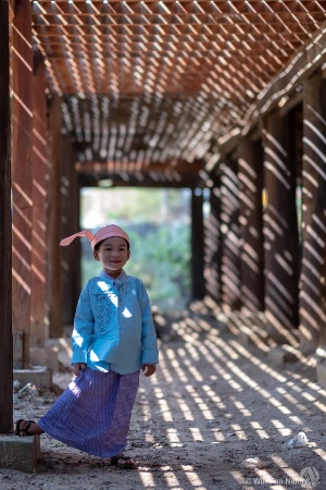 Happy smiling young burmese boy