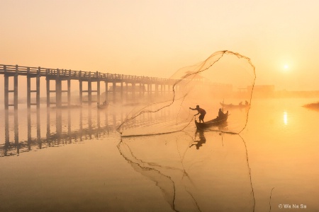 Fisherman at U Bein sunrise.
