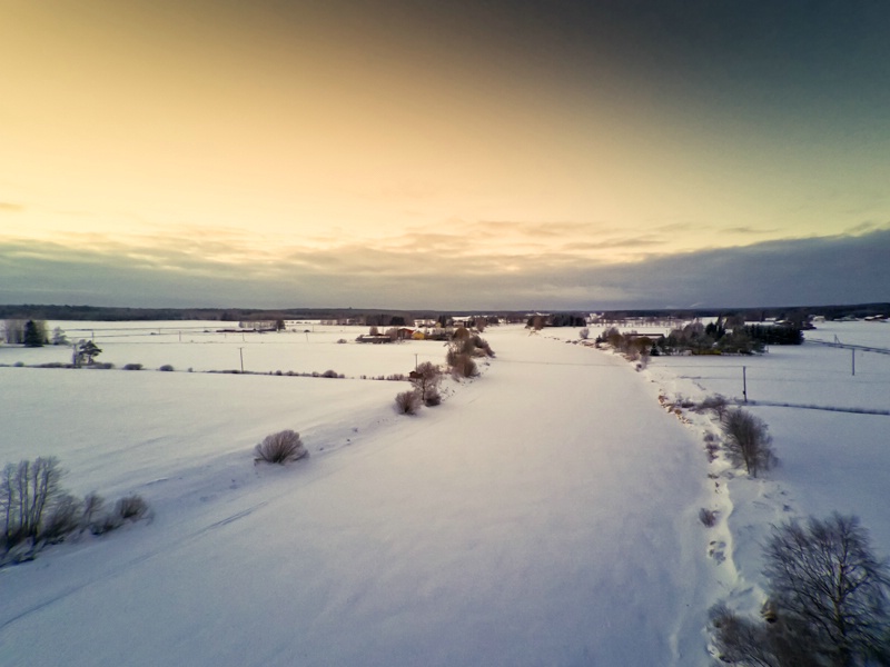 Sunset Over Icy River Bend