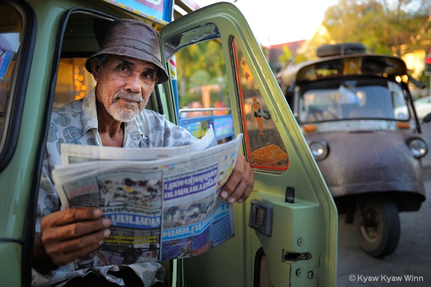 The Man with Newspaper  - ID: 15704069 © Kyaw Kyaw Winn