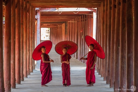 Three Novices walking on ancient temple