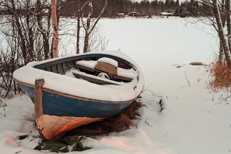 Old Fishing Boat Covered With Snow