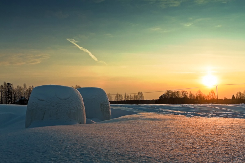 Two Bales In The Winter Sunset