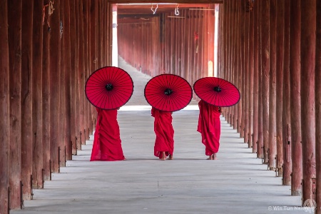 Back side of three Buddhist novices