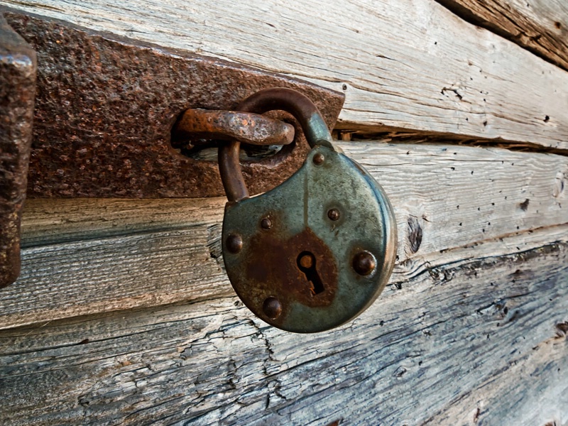 Old Lock On A Wooden Door